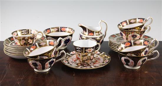 A Royal Crown Derby teaset, a tea cup, a coffee cup and plat